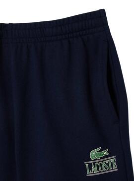 Bermuda Lacoste Badge Marinho para Homem e Mulher.