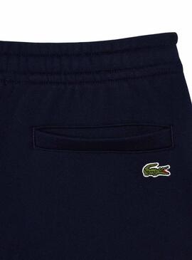 Bermuda Lacoste Badge Marinho para Homem e Mulher.