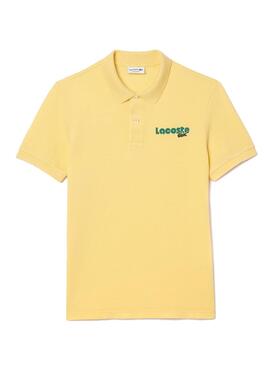 Camisa polo retro amarela Lacoste para homens.