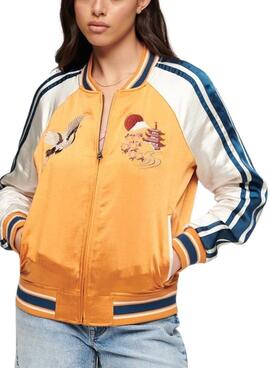 Jaqueta Superdry Suikajan laranja para mulher.
