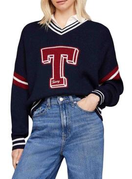 Suéter Tommy Jeans Letterman azul marinho para mulher.