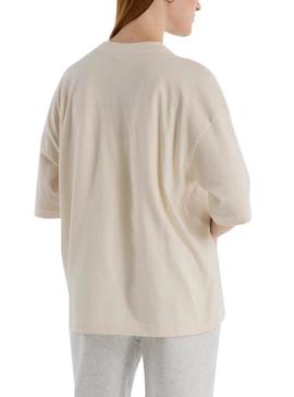 Camiseta New Balance bege com flores para mulher