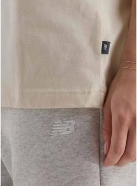 Camiseta New Balance bege com flores para mulher