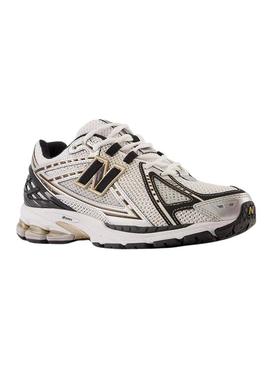Sapatilhas New Balance M1906RA prata metálica para homem.