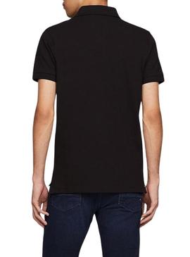Camisa Polo Tommy Hilfiger 1985 preta para homem.
