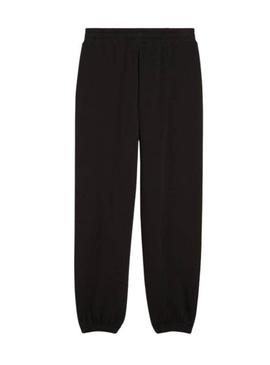 Calças Puma Wardrobe pretas para mulher.
