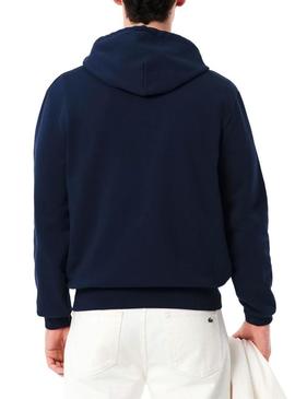 Moletom com capuz de pelúcia marinho Lacoste para homem.