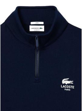 Moletom Lacoste com gola alta e zíper marinho para homens e mulheres.