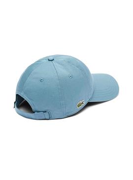 Boné Lacoste em sarja azul para homem e mulher.