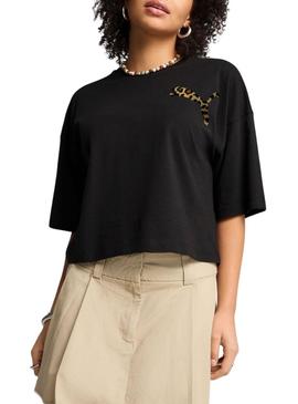 Camiseta Puma Leo Luxe preta para mulher.