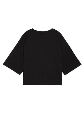 Camiseta Puma Leo Luxe preta para mulher.