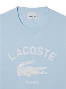 Camiseta Lacoste com estampa de logo azul para homens e mulheres.