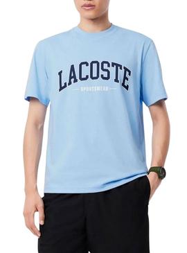 Camiseta Lacoste com logotipo esportivo azul para homem.
