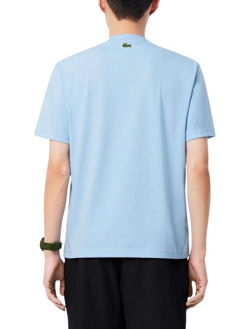Camiseta Lacoste com logotipo esportivo azul para homem.