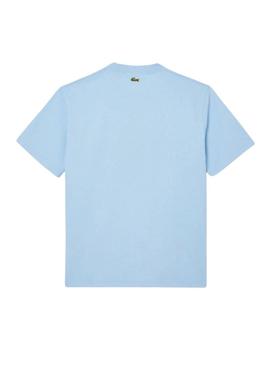Camiseta Lacoste com logotipo esportivo azul para homem.