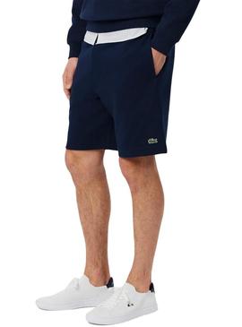 Calça de jogging curta Lacoste azul marinho para homem.