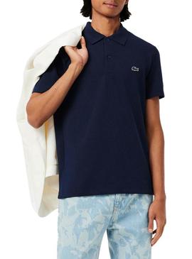 Camisa polo Lacoste com bordas em azul marinho para homem.