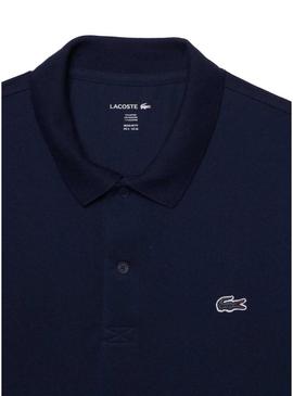 Camisa polo Lacoste com bordas em azul marinho para homem.