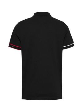 Camisa Polo Tommy Jeans Slim Flag preta para homem.