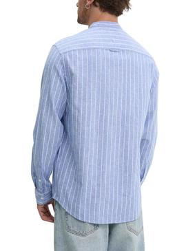 Camisa Tommy Jeans de linho às riscas azul e branco para homem.