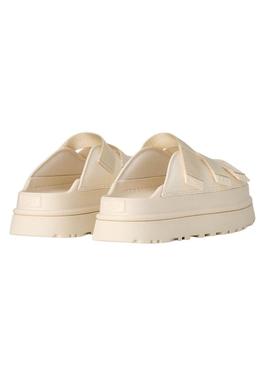 Sandálias UGG Goldenglow Slide bege para mulher.