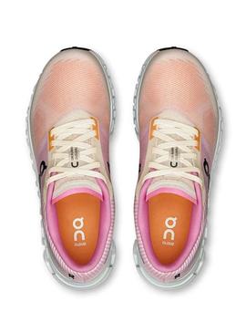 Tênis On Cloud 6 rosa e laranja para mulher.