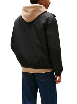 Jaqueta Tommy Jeans Essential Padded preta para homem.
