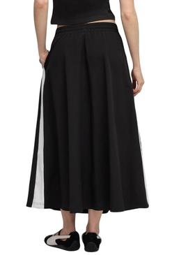 Saia Puma T7 woven midi preta para mulher.