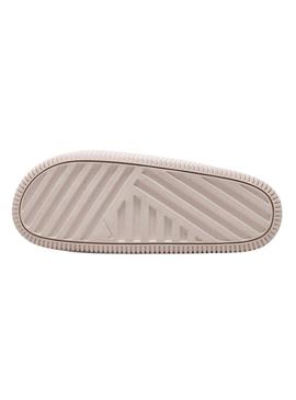 Chinelos Nike Calm bege para mulher.