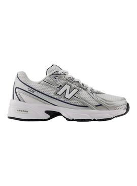 Sapatilhas New Balance U740 branco e marinho para mulher.