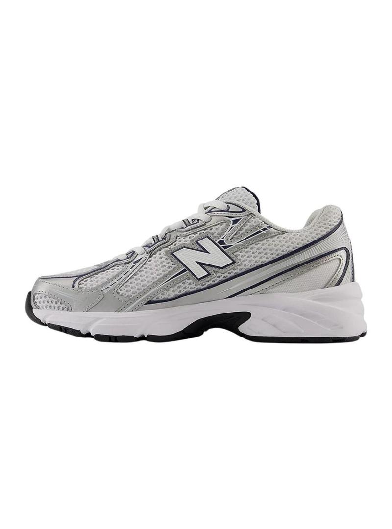Sapatilhas New Balance U740 branco e marinho para mulher.