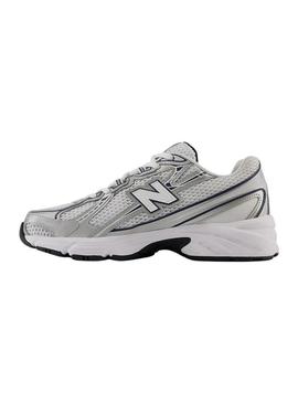 Sapatilhas New Balance U740 branco e marinho para mulher.