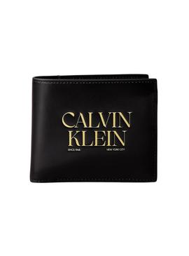 Carteira Calvin Klein Jeans Billfold preta e amarela para homem.