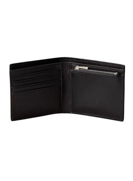 Carteira Calvin Klein Jeans Billfold preta e amarela para homem.