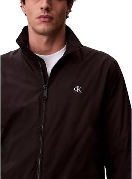Casaco Calvin Klein Jeans Harrington preto para homem.