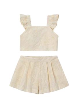 Conjunto de top e shorts bege para menina.