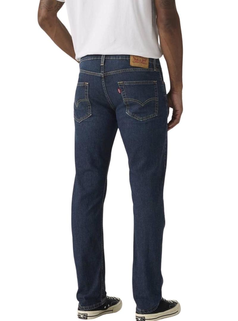 Calça jeans Levis 502 taper escura para homem.
