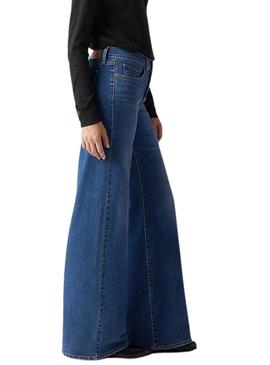 Calça jeans Levis 318 denim médio para mulher.