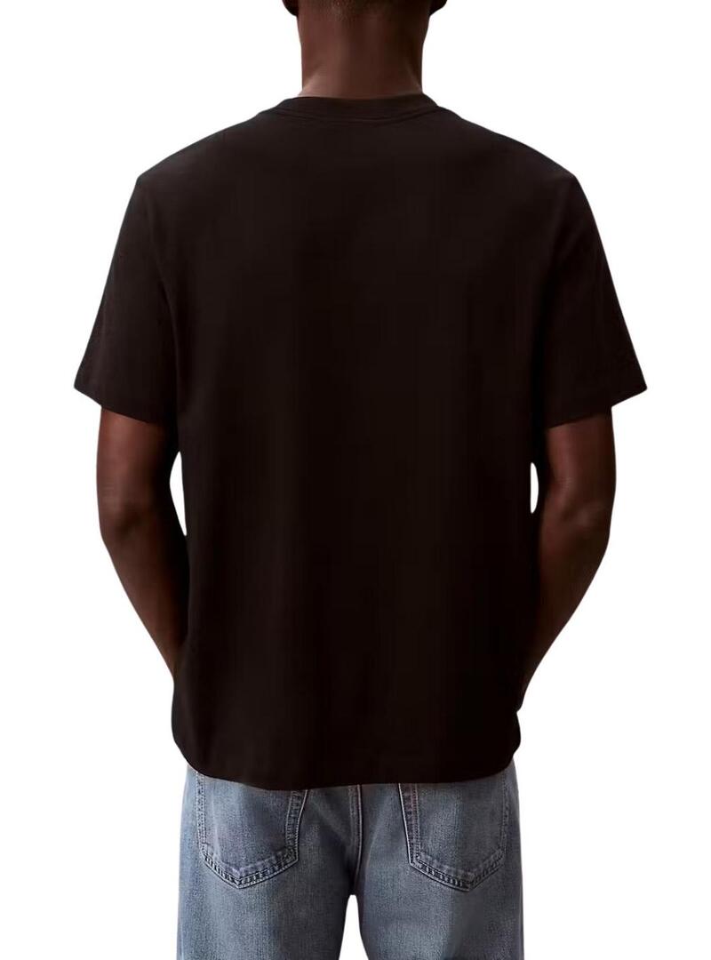 Camiseta Calvin Klein Jeans March preta para homem.
