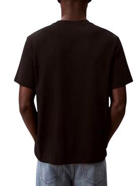 Camiseta Calvin Klein Jeans March preta para homem.