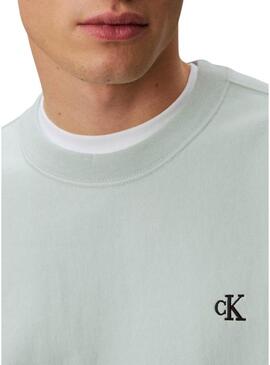 Moletom Calvin Klein Jeans turquesa para homem.