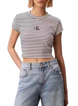 Camiseta Calvin Klein Jeans listrada preta e branca para mulher.