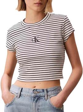 Camiseta Calvin Klein Jeans listrada preta e branca para mulher.