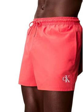 Calção Calvin Klein Jeans coral para homem.