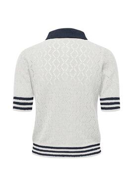 Camisa Polo Only Sunny branca e azul marinho para mulher.