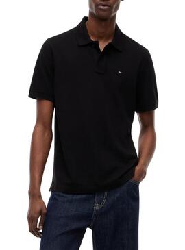 Camisa polo Tommy Jeans Essential preta para homem.