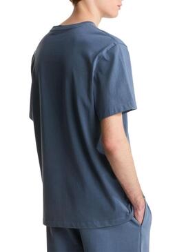 Camiseta The North Face minimalista azul para homem.