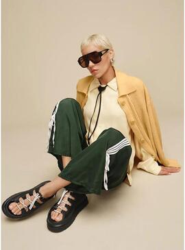 Sandálias UGG GoldenGlow Toggle preto para mulher.