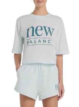 Camiseta New Balance oversize turquesa para mulher.