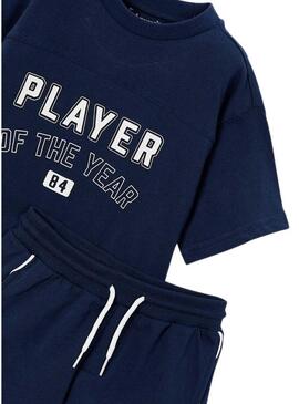 Conjunto camiseta e bermuda azul marinho esportiva para menino.